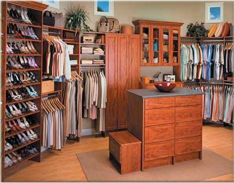 Picture of Closet Filled with Clothes.